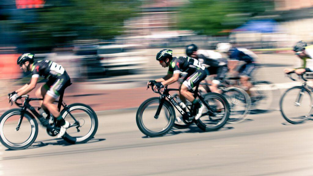 time lapse photography of bikers