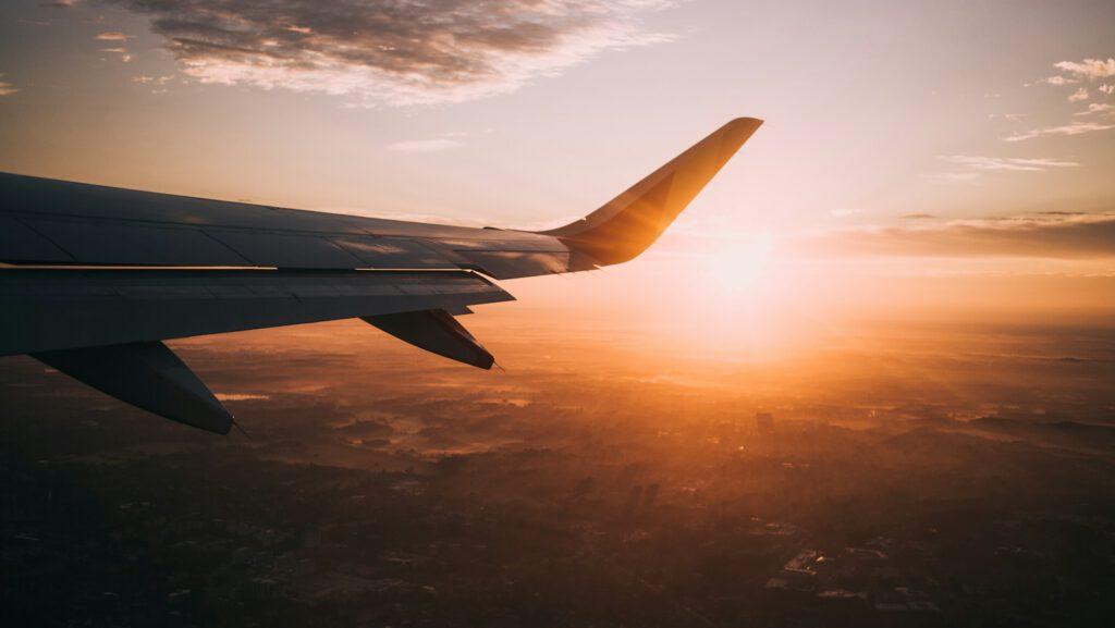 airplane on sky during golden hour